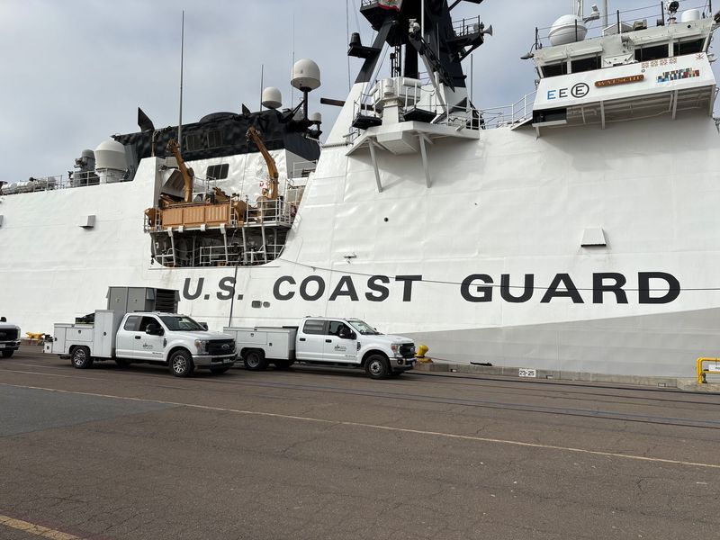 SDP service trucks supporting a US Coast Guard cutter