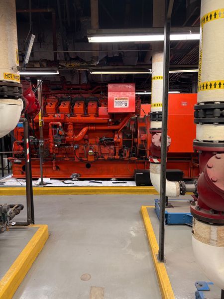 Industrial generator and piping in a utility room
